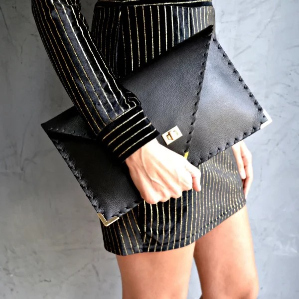 ANA Koutsi Clutch klein schwarz